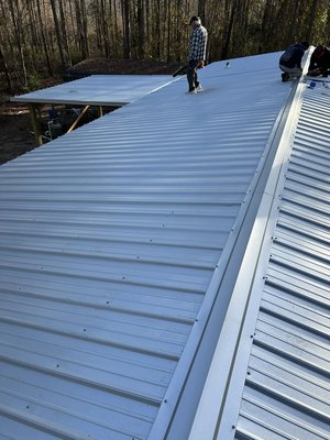 Metal Roof Installation - Here was a home that was damaged after a storm. We had to rebuild the lean two that was damaged, and install a new metal roof across the home and lean too. This roof comes with a 50 year warranty. Metal Roof Installation - Here was a home that was damaged after a storm. We had to rebuild the lean two that was damaged, and install a new metal roof across the home and lean too. This roof comes with a 50 year warranty.