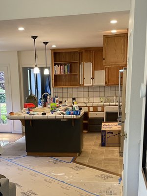 Kitchen Demo & Removal - The kitchen demo was done on an older but remodeled nice home. Kitchen just needed to be updated so we removed: countertops, cabinets, tile backsplash, several layers of flooring.