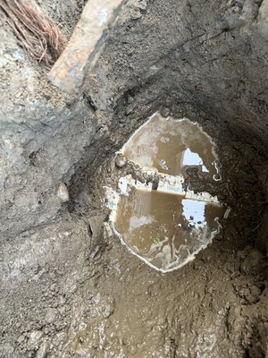 Drain repair - We got a call about gushing water in a crawl space. We started to pot hole and found this busted tee fitting. Not sure what happened, maybe it got damaged when the old fence got put in. Who knows, but we got out there right away and got it fixed! Pipes were heavily clogged with debris, jetted them out and added a clean out for good measure. We then cleaned up the area after backfill, spread straw and cleaned up their driveway nicer than it was before we showed up! Drain repair - We got a call about gushing water in a crawl space. We started to pot hole and found this busted tee fitting. Not sure what happened, maybe it got damaged when the old fence got put in. Who knows, but we got out there right away and got it fixed! Pipes were heavily clogged with debris, jetted them out and added a clean out for good measure. We then cleaned up the area after backfill, spread straw and cleaned up their driveway nicer than it was before we showed up!