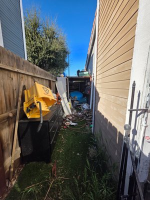 Home junk removal - We recently helped a homeowner clear out a large pile of unwanted junk that had built up around the property. Our team quickly loaded everything up, including old furniture, household items, and general clutter, leaving the space clean and ready to use again. Another smooth job completed by Rapid Haul Junk Removal.