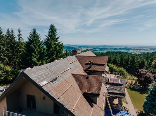 Residential Roofing Project - IronHead Roofing, a veteran-owned company proudly serving Oregon, recently completed a full roof replacement on a beautiful multi-story home in Philomath. The homeowner selected a premium architectural shingle that perfectly complements the home’s design while providing long-term protection against Oregon’s wet winters.
Our skilled in-house crews and trusted partners, supervised by IronHead foremen, delivered the project on time, within budget, and above expectations. The result — a stunning new roof built with craftsmanship, precision, and integrity.
Another example of why Oregon homeowners trust IronHead Roofing — Built to Last. Backed by Integrity. Residential Roofing Project - IronHead Roofing, a veteran-owned company proudly serving Oregon, recently completed a full roof replacement on a beautiful multi-story home in Philomath. The homeowner selected a premium architectural shingle that perfectly complements the home’s design while providing long-term protection against Oregon’s wet winters.
Our skilled in-house crews and trusted partners, supervised by IronHead foremen, delivered the project on time, within budget, and above expectations. The result — a stunning new roof built with craftsmanship, precision, and integrity.
Another example of why Oregon homeowners trust IronHead Roofing — Built to Last. Backed by Integrity.