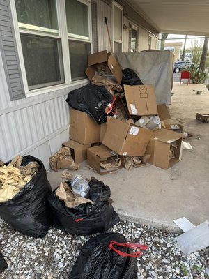 Boxes and Garbage Pickup - Porch and exterior cleanup completed by Shane’s Stellar Junk Removal in Tucson, AZ. This job involved removing piles of cardboard, trash bags, packaging materials, and general debris that had accumulated outside the home.

Our team quickly loaded everything into our trailer and hauled it away, leaving the porch clean and accessible again. Jobs like this are common for home cleanups, move-outs, deliveries, and general junk removal.