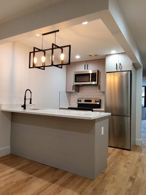 Kitchen Remodel 2023 - In our latest kitchen renovation project, we've seamlessly blended functionality with style. From maximizing space with custom cabinetry to selecting premium appliances and lighting fixtures, every detail has been meticulously planned. The result? A stunning, modern kitchen that exceeds our client's expectations and provides a space they'll love for years to come. Make this yours today!