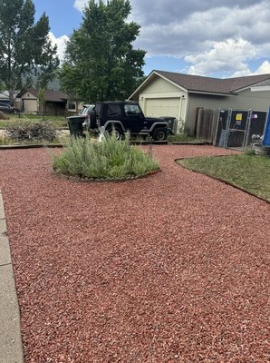 Howell, landscaping project - Removed 14 tons of rock, graded dirt, put down weed killer, played black weed stopper mat under rock and poured rock and graded once more