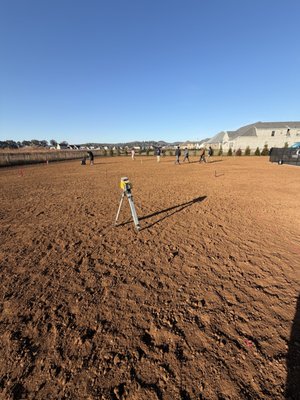 Total Lawn Renovation - Laser grading with screened topsoil along with fescue sod installation. Total Lawn Renovation - Laser grading with screened topsoil along with fescue sod installation.