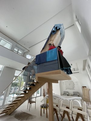 Long and Heavy 12ft Bench, up 2 flights of stairs. - This large and heavy bench was a bit difficult challenge. But with men power, experience, and dedication, we got the job done. No Job is too Big for Fuentes Moving Corp.