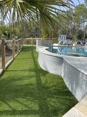Elevated Pool Side Application - The home backs up to marshlands and during high tides and heavy rains, it is not ucommon for water to make its way up the pool, leaving debris and stains.  We used a vertical application and coated the side of the pool, and added custom flake which gave a vibrant look!