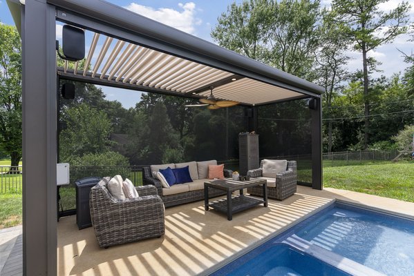 Struxure® Mid-Atlantic Poolside Pergola - From a simple concrete pad to a beautiful Struxure® Pergola that provides comfort, functionality, and style. This household added a fan for comfort in warmer weather and screens for privacy and weather control. Struxure® Mid-Atlantic Poolside Pergola - From a simple concrete pad to a beautiful Struxure® Pergola that provides comfort, functionality, and style. This household added a fan for comfort in warmer weather and screens for privacy and weather control.