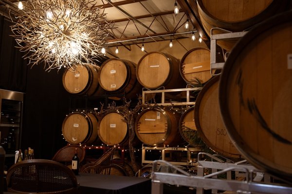 Wine Tastings at The Winery by Appointment Only - Join us for a unique wine tasting experience among the barrels, tanks and aroma of the winery itself. We'll walk you through each of the wines we pour, discussing the grape variety and the vineyards the grapes come from. Depending on your level of interest, we'll be happy to show you the equipment we use in making wine as well as other tools of the craft.
Our basic tasting includes a pour of 5 different wines ($25). We also offer the same tasting with a small-bite food pairing for each wine included ($35). Wine is also available for purchase by the glass and bottle. Each tasting generally takes from 1 to 1-1/2 hours. Reservations are required in advance so that we may coordinate with other work being performed in the winery. We look forward to seeing you soon. Wine Tastings at The Winery by Appointment Only - Join us for a unique wine tasting experience among the barrels, tanks and aroma of the winery itself. We'll walk you through each of the wines we pour, discussing the grape variety and the vineyards the grapes come from. Depending on your level of interest, we'll be happy to show you the equipment we use in making wine as well as other tools of the craft.
Our basic tasting includes a pour of 5 different wines ($25). We also offer the same tasting with a small-bite food pairing for each wine included ($35). Wine is also available for purchase by the glass and bottle. Each tasting generally takes from 1 to 1-1/2 hours. Reservations are required in advance so that we may coordinate with other work being performed in the winery. We look forward to seeing you soon.