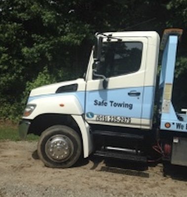 Towing & More - SAFE Towing offers a variety of roadside assistance and towing services across Apex, Raleigh, and Cary. Our highly-trained personnel are experienced in all vehicle makes and models, which ensures proper handling during transport or during emergency jumpstarts. SAFE Towing is committed to quick response roadside assistance so that you can get back on your way ASAP.

Our roadside assistance and towing services:
Accident Towing
Car Lockouts
Flatbed Towing
Jump Starts
Tire Changing
Winch Outs