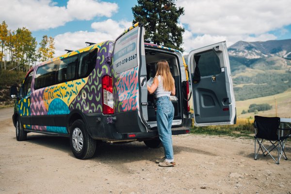Del Mar Camper Van - Freedom meets flexibility with our Del Mar camper van, built for travelers who want extra space without compromising on convenience. Whether you're chasing sunsets on the coast, road-tripping through national parks, or heading to your favorite festival, the Del Mar is designed to make every adventure effortless and unforgettable.The Del Mar model is built for up to five travelers, making it ideal for families, friends, or small groups. Its attached pop-up rooftop provides extra standing room inside while the van is parked and an additional sleeping area, giving you more space to move, relax, and rest. With a well-equipped kitchenette, a cozy sleeping setup, and plenty of storage, this campervan is designed to make your journey effortless. Thoughtful features like Bluetooth connectivity, built-in lighting, and USB ports ensure you stay comfortable and connected wherever the road takes you. Whether you're hitting the road for a national park adventure, a coastal getaway, or a music festival weekend, the Del Mar makes every trip unforgettable.Looking to take your road trip to the next level? Rent the Del Mar today and experience van life with Escape Camper Vans! Del Mar Camper Van - Freedom meets flexibility with our Del Mar camper van, built for travelers who want extra space without compromising on convenience. Whether you're chasing sunsets on the coast, road-tripping through national parks, or heading to your favorite festival, the Del Mar is designed to make every adventure effortless and unforgettable.The Del Mar model is built for up to five travelers, making it ideal for families, friends, or small groups. Its attached pop-up rooftop provides extra standing room inside while the van is parked and an additional sleeping area, giving you more space to move, relax, and rest. With a well-equipped kitchenette, a cozy sleeping setup, and plenty of storage, this campervan is designed to make your journey effortless. Thoughtful features like Bluetooth connectivity, built-in lighting, and USB ports ensure you stay comfortable and connected wherever the road takes you. Whether you're hitting the road for a national park adventure, a coastal getaway, or a music festival weekend, the Del Mar makes every trip unforgettable.Looking to take your road trip to the next level? Rent the Del Mar today and experience van life with Escape Camper Vans!