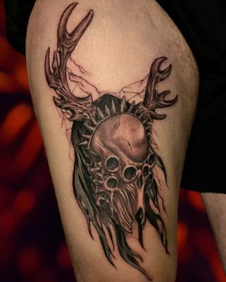 Black and Grey - Our artist can provide deep, rich black and grey tattoos in an artistic or realism style