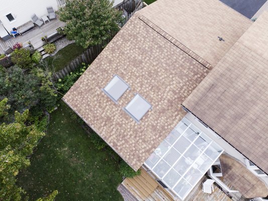 Skylight Repair - This job was completed for a couple in Orleans who had experienced a leak around two new skylights. After determining the problem was with the flashing kit we installed two new kits and upgraded their underlayment with complete layer of WinterGuard Ice and Water Shield, and installed new CertainTeed Landmark Pro Shingles with a full 50 year warranty.