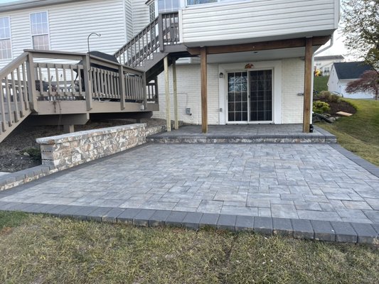 Paver patio & walkway - We removed a concrete patio with 30” walkway in front of the deck that wrapped around the pool. Graded the area for a larger paver patio with retaining walls, sitting walls and expanded the walkway. The project turned out amazing as the owners kindly put it. Paver patio & walkway - We removed a concrete patio with 30” walkway in front of the deck that wrapped around the pool. Graded the area for a larger paver patio with retaining walls, sitting walls and expanded the walkway. The project turned out amazing as the owners kindly put it.