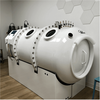 Hyperbaric Oxygen Therapy (HBOT) - Have you heard whispers of this revolutionary technology that harnesses the body's natural healing power? Hyperbaric oxygen therapy (HBOT) is a safe and effective medical treatment that utilizes pressurized chambers to deliver concentrated oxygen throughout your body. At Capital Chiropractic, we're proud to host Iowa HBOT, the first and only medical-grade hyperbaric oxygen therapy clinic in Central Iowa (and the region) for off-label use. This seamless collaboration allows us to provide you with the most advanced HBOT treatments available, conveniently delivered alongside all of our services.

Safety First: A Treatment You Can Trust
HBOT is a well-established medical treatment with a proven safety record. Our hyperbaric chamber is FDA-approved and operated by our team of highly trained and certified specialists. Your comfort and well-being are our top priorities, and we will closely monitor you throughout the entire procedure.
Beyond Oxygen Deprivation: A Wide Range of Applications
While traditionally used for decompression sickness in divers, HBOT's applications extend far beyond. The powerful influx of oxygen can stimulate healing, reduce inflammation, and fight infection in a variety of conditions, including:

Chronic Wounds: Diabetic foot ulcers, pressure sores, and other wounds that resist traditional treatment can find new life with HBOT.

Sudden Hearing Loss: HBOT can improve hearing outcomes in some cases of sudden sensorineural hearing loss.

Brain Injuries: Increased oxygen delivery may support recovery after traumatic brain injury or stroke.
Infection: HBOT can enhance the body's ability to fight certain infections, particularly those involving bone or tissue with poor circulation.

Radiation Injury: HBOT can help reduce side effects of radiation therapy for cancer.

And Many More!