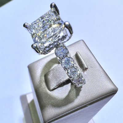 Custom Wedding Anniversary Ring - 18K White Gold Custom Anniversary Ring
4.24 Ct. Princess-Cut Diamond
with 3.83 Ct in Accent Stones
TCW: 8.06 Ct Custom Wedding Anniversary Ring - 18K White Gold Custom Anniversary Ring
4.24 Ct. Princess-Cut Diamond
with 3.83 Ct in Accent Stones
TCW: 8.06 Ct