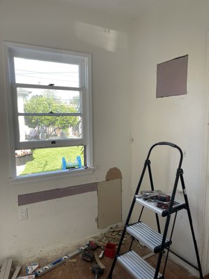 Mudroom to office remodel - This room started out as a mudroom with a traditional water heater. Phase 1 remove, replace, and relocate to a tankless outside. Phase 2 cut, prep, stain and finish butcher block. Phase 3 add receptacle, source mounting hardware for butcher block and TV. Phase 4 install.