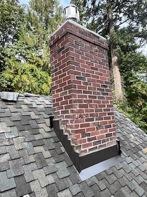 New cricket and flashing - Standard repairs to the chimney flashing we recommend if there are signs of damage or deterioration. Here, the brick was in great shape so we don’t need to replace it as we are fairly in our proposals!