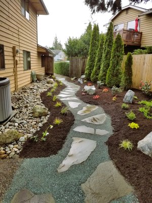 Pathways & Dry River Beds - We have done several pathways and dry river beds to help bring a landscape together. Pathways & Dry River Beds - We have done several pathways and dry river beds to help bring a landscape together.