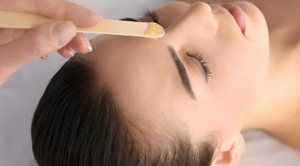 Facial Waxing - Our facial waxing is the perfect solution for individuals seeking impeccably groomed, hair-free skin. Experience the timeless allure of this trusted method, expertly administered by our skilled estheticians. Whether you desire precisely shaped eyebrows, the elimination of upper lip hair, or shaping up your sideburns, our meticulous attention to detail ensures a flawless complexion that boosts your self-assurance.
Enjoy the long-lasting smoothness that facial waxing offers, sparing you the daily upkeep of shaving. Bid farewell to stubble and say hello to weeks of silky, uninterrupted skin. The wax gently removes unwanted hair and exfoliates, unveiling a brighter, more radiant complexion. Our estheticians prioritize your comfort, employing top-quality wax and techniques to minimize discomfort during the process.
Embrace the convenience of fewer touch-ups as waxing encourages finer, softer regrowth that remains inconspicuous between sessions. Our personalized approach ensures that your facial waxing experience is tailored to your unique preferences and concerns. Reveal your natural beauty with confidence and grace through our Facial Waxing services. Say goodbye to unwanted hair and hello to radiant, polished skin! Facial Waxing - Our facial waxing is the perfect solution for individuals seeking impeccably groomed, hair-free skin. Experience the timeless allure of this trusted method, expertly administered by our skilled estheticians. Whether you desire precisely shaped eyebrows, the elimination of upper lip hair, or shaping up your sideburns, our meticulous attention to detail ensures a flawless complexion that boosts your self-assurance.
Enjoy the long-lasting smoothness that facial waxing offers, sparing you the daily upkeep of shaving. Bid farewell to stubble and say hello to weeks of silky, uninterrupted skin. The wax gently removes unwanted hair and exfoliates, unveiling a brighter, more radiant complexion. Our estheticians prioritize your comfort, employing top-quality wax and techniques to minimize discomfort during the process.
Embrace the convenience of fewer touch-ups as waxing encourages finer, softer regrowth that remains inconspicuous between sessions. Our personalized approach ensures that your facial waxing experience is tailored to your unique preferences and concerns. Reveal your natural beauty with confidence and grace through our Facial Waxing services. Say goodbye to unwanted hair and hello to radiant, polished skin!