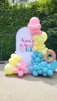 Balloon Garland - We LOVE to do balloon garland for our clients! It's a nice way to add to the theme and ambiance of your event. Give us a ring today and let's talk about your ideas!
