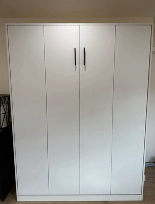 Assembly of a built-in Murphy bed - I started with a thorough check of all the parts and tools, laying them out in a well-lit room. I easily connected the side panels with the headboard and footboard, using my professional screwdriver for quick and reliable fastening. I installed the lifting mechanism with my usual precision, ensuring the gas shock absorbers worked smoothly and the bed raised and lowered effortlessly. Then I secured the mattress base, adding crossbars for extra strength, and firmly attached the structure to the wall with anchor bolts to ensure safety.
My work was neat and professional: all elements were perfectly aligned, and the bed stood sturdy. After placing the mattress, I checked the result, making sure everything was perfect, and the client was satisfied. Assembly of a built-in Murphy bed - I started with a thorough check of all the parts and tools, laying them out in a well-lit room. I easily connected the side panels with the headboard and footboard, using my professional screwdriver for quick and reliable fastening. I installed the lifting mechanism with my usual precision, ensuring the gas shock absorbers worked smoothly and the bed raised and lowered effortlessly. Then I secured the mattress base, adding crossbars for extra strength, and firmly attached the structure to the wall with anchor bolts to ensure safety.
My work was neat and professional: all elements were perfectly aligned, and the bed stood sturdy. After placing the mattress, I checked the result, making sure everything was perfect, and the client was satisfied.