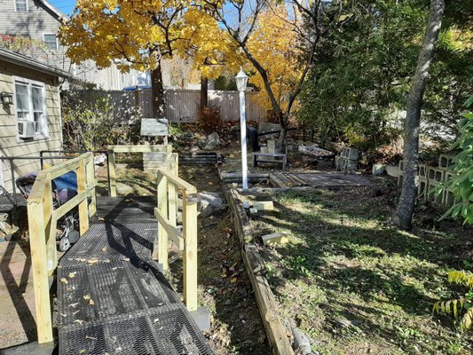 Handicap Ramp railings, yard clean-up - This was an existing ramp that needed railings for a disabled customer. Handicap Ramp railings, yard clean-up - This was an existing ramp that needed railings for a disabled customer.