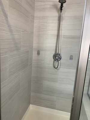 Shower stain - This showers grout was very discolored, and inconsistent throughout. I applied an epoxy colored sealant, to make all the grout lines match again. This epoxy also resists stains, and makes cleaning much easier in the future!