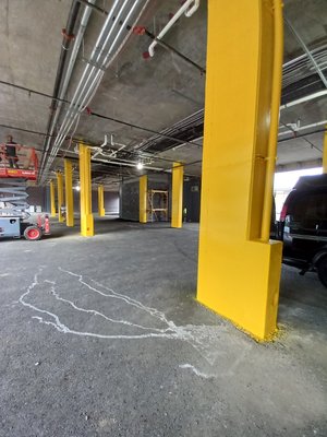 Commercial Job - Great columns painted with safety yellow. Commercial Job - Great columns painted with safety yellow.