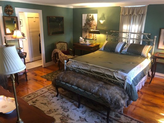 The Garden Suite - Featuring a queen-sized bed and ensuite full bath, the Garden Suite is the perfect couple's getaway for your holiday to Marion. Beautifully decorated with period furniture and fine art, this suite is situated on the northeast corner of the house on the second floor, overlooking manicured lawns with an orchard and gardens. WiFi and a refrigerator are available in all suites!