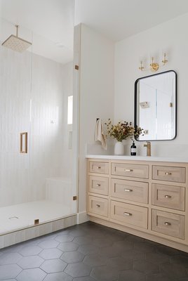 Modern Farmhouse New Build – Bright, Warm, and Inviting - Wilson Construction Co. proudly built this stunning modern farmhouse from the ground up. Featuring a light-filled kitchen with custom white cabinetry, natural wood accents, and designer finishes, this home blends clean modern lines with timeless farmhouse charm. Outside, the board-and-batten siding, black windows, and welcoming front porch create the perfect balance of rustic and refined. A true showcase of craftsmanship, comfort, and style.