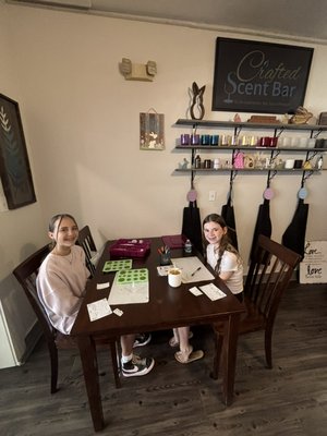 Spring Break Classes - Spring Break at Crafted Scent Bar was full of creativity, laughter, and hands-on fun for all ages. Families, friends, and visitors looking for something different found the perfect indoor activity—blending their own custom scents and creating candles, perfumes, and more.
We offered special Spring Break pricing for students (with a participating adult), along with a full experience that went beyond just making a candle. Guests enjoyed complimentary treats, a fun scavenger hunt around Mount Dora, fun scent facts, and a surprise extra that made the visit even more memorable. Spring Break Classes - Spring Break at Crafted Scent Bar was full of creativity, laughter, and hands-on fun for all ages. Families, friends, and visitors looking for something different found the perfect indoor activity—blending their own custom scents and creating candles, perfumes, and more.
We offered special Spring Break pricing for students (with a participating adult), along with a full experience that went beyond just making a candle. Guests enjoyed complimentary treats, a fun scavenger hunt around Mount Dora, fun scent facts, and a surprise extra that made the visit even more memorable.
