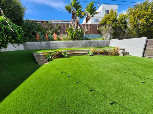 Turf Install - Turf installation complete: seamless, natural-looking lawn ready for use! Turf Install - Turf installation complete: seamless, natural-looking lawn ready for use!