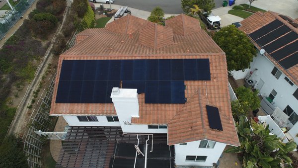 Oceanside Solar Installation 9.02 kW (92056) - This installation was taken over from another contractor. We removed the existing solar pool panels and re-installed them onto the patio cover. We assisted the homeowner in transferring the SDG&E application and finally installed this 9.02 kW system - consisting of Silfab modules and Enphase microinverters. Oceanside Solar Installation 9.02 kW (92056) - This installation was taken over from another contractor. We removed the existing solar pool panels and re-installed them onto the patio cover. We assisted the homeowner in transferring the SDG&E application and finally installed this 9.02 kW system - consisting of Silfab modules and Enphase microinverters.