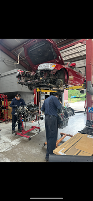 Engine Repair - In action fixing engines