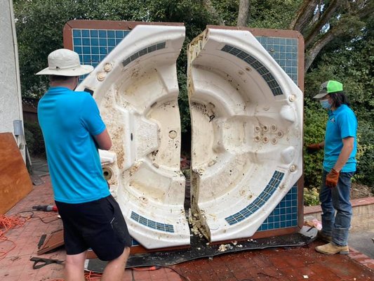 Hot Tub Removal - This hot tub removal was done for a sweet couple in Sparks. They called and that day we came out to do an estimate. We provided the customer with information on how to prepare the hot tub for removal, find the electrical, and drain the tub.
The next day we arrived onsite and cut the tub into two pieces, and hauled it off for them. The project took around 1.5 hours. They were very pleased with our work and will be calling us again in the near future! Hot Tub Removal - This hot tub removal was done for a sweet couple in Sparks. They called and that day we came out to do an estimate. We provided the customer with information on how to prepare the hot tub for removal, find the electrical, and drain the tub.
The next day we arrived onsite and cut the tub into two pieces, and hauled it off for them. The project took around 1.5 hours. They were very pleased with our work and will be calling us again in the near future!