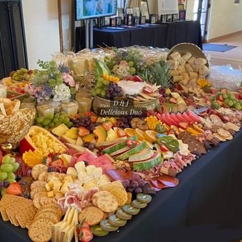 Custom Charcuterie Boards for Every Occasion - At D & J Delicious Duo, we believe every gathering deserves a personal touch. Our charcuterie boards and spreads are fully customized for each event—whether it’s an intimate dinner at home, a milestone celebration, or a large event like a wedding or corporate function.

We work closely with you to design a spread that fits your theme, preferences, and budget, using only the finest cheeses, meats, chocolates, crackers, and more. As a family-owned, mother-and-daughter team, we’re passionate about creating beautiful, delicious displays that elevate any occasion and leave a lasting impression.
