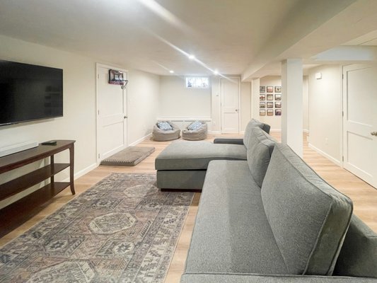 Basement Remodel - We were able to help these homeowners turn their wet, cold, and dreary basement into a bonus space all can enjoy. If you are looking to add square footage and extra space to your home, call us for your basement project today!