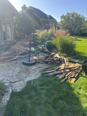 Porch demolition and cleanout job - This project included removing and disposing of top decking boards from backyard, 
It was one person and full pickup job that took about 4h