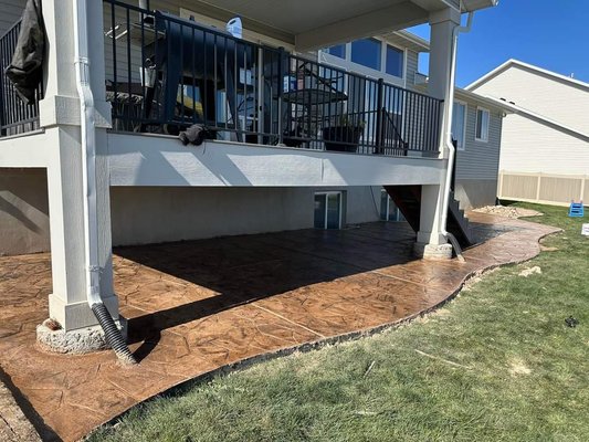 Stamped concrete - Customer moved into a new house and needed some concrete work in their backyard. Enhancing their beautiful home even more! Stamped concrete - Customer moved into a new house and needed some concrete work in their backyard. Enhancing their beautiful home even more!