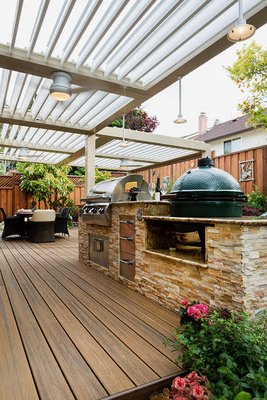Outdoor Kitchen Design & Installation - The modern outdoor kitchen features not only a grill, but also refrigerators, sinks, storage drawers, rotisseries, smokers, pizza ovens, and even beer taps. Our kitchens are completely customizable to fit your space, needs, and wants. Stainless steel appliances paired with natural stone finishes give your yard that “one of a kind” look. Granite countertops are a great low maintenance option for your outdoor kitchen or if you are looking to add a modern flair poured concrete countertops will help you achieve the look. Outdoor Kitchen Design & Installation - The modern outdoor kitchen features not only a grill, but also refrigerators, sinks, storage drawers, rotisseries, smokers, pizza ovens, and even beer taps. Our kitchens are completely customizable to fit your space, needs, and wants. Stainless steel appliances paired with natural stone finishes give your yard that “one of a kind” look. Granite countertops are a great low maintenance option for your outdoor kitchen or if you are looking to add a modern flair poured concrete countertops will help you achieve the look.