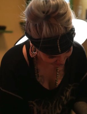 Meet Gina - Gina, or as we call her "The Disney Witch" is known for her bright and saturated color pieces. Gina excels in tattooing Disney, anime, and all things nerd culture, but can do anything. Gina is a crazy cat lady/animal lover, so loves doing pet portrait of your fur babies! She also has nice crystals and essential oils diffusing nearby so you feel at peace LOL :) Meet Gina - Gina, or as we call her "The Disney Witch" is known for her bright and saturated color pieces. Gina excels in tattooing Disney, anime, and all things nerd culture, but can do anything. Gina is a crazy cat lady/animal lover, so loves doing pet portrait of your fur babies! She also has nice crystals and essential oils diffusing nearby so you feel at peace LOL :)