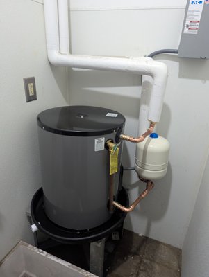 Double Trouble - This commercial customer had two failed 20 gallon heaters they inherited with the building, which we found to be electrically sized improperly! We coordinated and tackled both heaters in one day, minimizing disruption to the workflow of the facility. New thermal expansion tanks, drain pans, and electrical whips from the breaker boxes for a clean finish. Double Trouble - This commercial customer had two failed 20 gallon heaters they inherited with the building, which we found to be electrically sized improperly! We coordinated and tackled both heaters in one day, minimizing disruption to the workflow of the facility. New thermal expansion tanks, drain pans, and electrical whips from the breaker boxes for a clean finish.
