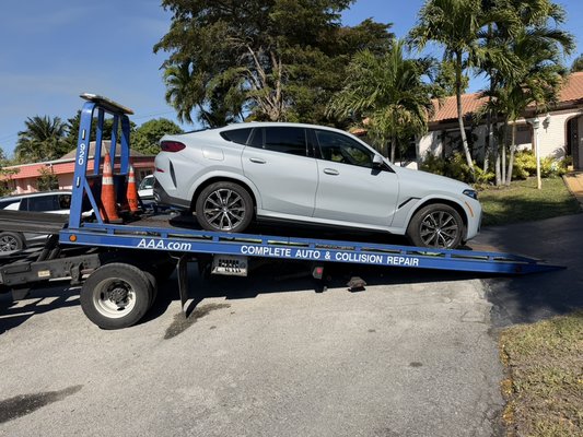 Customer call for tow service - 2026 BMW with two flat tires