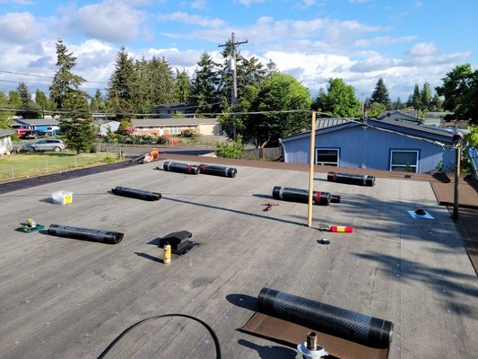 Tacoma Flat roof replacement - Tore off the existing torch down roof and replaced with new torch down Tacoma Flat roof replacement - Tore off the existing torch down roof and replaced with new torch down