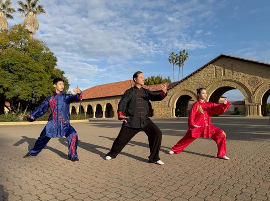 Tai Chi Qigong for Beginners, Tai Chi Lineage Heritage Program, Traditional Chen Tai Chi, Yang Tai Chi, Master Lecture, Tai Chi Workshops - Our center is dedicated to offering high-quality Tai Chi and Health Qigong training rooted in tradition, science, and global collaboration. Under the leadership of Master Shudong Li, an internationally respected figure in martial arts, wellness, and Tai Chi education, we provide comprehensive programs designed for beginners, dedicated practitioners, and students seeking authentic lineage-based instruction.
Master Shudong Li has long devoted himself to the international promotion of Wushu, Tai Chi wellness, and Health Qigong. He has collaborated with professor teams at Stanford University and has participated in multiple national-level scientific research projects on Tai Chi and health in the United States. He also helped establish the first accredited Medical Tai Chi course at the Stanford School of Medicine. As a key organizer of major international forums and events, Master Li has served as a principal leader for the International Taiji Science Forum and World Tai Chi Heritage Exhibition, the Stanford Silicon Valley Health Forum, and as a conference ambassador for the Harvard International Tai Chi and Mind–Body Health Summit. He has supported national-level martial arts championships, collegiate Wushu events, and various community wellness programs.
Master Li has also served as Vice President of the International Health Qigong Federation and currently sits on the International Wushu Federation Kungfu Committee. As one of the leading representatives of Chen-style Tai Chi in the United States, he has organized major international competitions including the Pan American Wushu Championships, Traditional Wushu Championships, California International Wushu Championships, the U.S. National Wushu Championships, and national team selection events. As a team leader and coach of the U.S. National Wushu Team, he has led delegations to the World Wushu Championships, World Taijiquan Championships, World Sports Games, and other international competitions.
With this strong cultural, academic, and organizational foundation, our center actively collaborates with renowned experts from different Tai Chi lineages, Qigong masters, wellness scholars, and world champions. Each year, we host workshops, master seminars, and educational events to promote systematic teaching, cultural exchange, and high-level training opportunities for our community.
We offer a series of structured programs to support different learning goals:
Tai Chi & Qigong for Beginners
A welcoming program designed to help new students build a solid foundation in Tai Chi movement, posture, breathing, and simple Health Qigong routines. The class focuses on improving balance, relaxation, mobility, and overall wellness. It is ideal for adults and seniors who wish to begin their Tai Chi journey in a gentle and encouraging environment.
Tai Chi Lineage Heritage Program
This in-depth program preserves the authenticity of traditional Tai Chi through classical forms, silk-reeling principles, structural alignment, and internal strength development. Students learn authentic training methods passed down through recognized lineages, with personalized corrections and clear progression. It is perfect for learners seeking traditional depth, precision, and cultural heritage.
Traditional Tai Chi & Qigong Master Lecture Series
This series offers rare access to master-level instruction, featuring explanations of classical theory, body mechanics, breathing systems, internal energy pathways, and the cultural foundations of Tai Chi and Qigong. Students receive detailed demonstrations and hands-on guidance that deepen understanding beyond regular practice.
Tai Chi for Health & Wellness
A health-centered program integrating Tai Chi and Qigong methods to support long-term well-being. This class is designed to enhance mobility, reduce stress, improve balance, increase energy, and promote emotional stability. It is an excellent option for those seeking sustainable and holistic wellness training.
Through professional instruction, international collaboration, and a strong commitment to cultural preservation, our center provides a supportive and enriching environment for students at every level. Whether your goal is health improvement, traditional study, or deep personal cultivation, we offer a meaningful and authentic path to experiencing the benefits of Tai Chi and Qigong. Tai Chi Qigong for Beginners, Tai Chi Lineage Heritage Program, Traditional Chen Tai Chi, Yang Tai Chi, Master Lecture, Tai Chi Workshops - Our center is dedicated to offering high-quality Tai Chi and Health Qigong training rooted in tradition, science, and global collaboration. Under the leadership of Master Shudong Li, an internationally respected figure in martial arts, wellness, and Tai Chi education, we provide comprehensive programs designed for beginners, dedicated practitioners, and students seeking authentic lineage-based instruction.
Master Shudong Li has long devoted himself to the international promotion of Wushu, Tai Chi wellness, and Health Qigong. He has collaborated with professor teams at Stanford University and has participated in multiple national-level scientific research projects on Tai Chi and health in the United States. He also helped establish the first accredited Medical Tai Chi course at the Stanford School of Medicine. As a key organizer of major international forums and events, Master Li has served as a principal leader for the International Taiji Science Forum and World Tai Chi Heritage Exhibition, the Stanford Silicon Valley Health Forum, and as a conference ambassador for the Harvard International Tai Chi and Mind–Body Health Summit. He has supported national-level martial arts championships, collegiate Wushu events, and various community wellness programs.
Master Li has also served as Vice President of the International Health Qigong Federation and currently sits on the International Wushu Federation Kungfu Committee. As one of the leading representatives of Chen-style Tai Chi in the United States, he has organized major international competitions including the Pan American Wushu Championships, Traditional Wushu Championships, California International Wushu Championships, the U.S. National Wushu Championships, and national team selection events. As a team leader and coach of the U.S. National Wushu Team, he has led delegations to the World Wushu Championships, World Taijiquan Championships, World Sports Games, and other international competitions.
With this strong cultural, academic, and organizational foundation, our center actively collaborates with renowned experts from different Tai Chi lineages, Qigong masters, wellness scholars, and world champions. Each year, we host workshops, master seminars, and educational events to promote systematic teaching, cultural exchange, and high-level training opportunities for our community.
We offer a series of structured programs to support different learning goals:
Tai Chi & Qigong for Beginners
A welcoming program designed to help new students build a solid foundation in Tai Chi movement, posture, breathing, and simple Health Qigong routines. The class focuses on improving balance, relaxation, mobility, and overall wellness. It is ideal for adults and seniors who wish to begin their Tai Chi journey in a gentle and encouraging environment.
Tai Chi Lineage Heritage Program
This in-depth program preserves the authenticity of traditional Tai Chi through classical forms, silk-reeling principles, structural alignment, and internal strength development. Students learn authentic training methods passed down through recognized lineages, with personalized corrections and clear progression. It is perfect for learners seeking traditional depth, precision, and cultural heritage.
Traditional Tai Chi & Qigong Master Lecture Series
This series offers rare access to master-level instruction, featuring explanations of classical theory, body mechanics, breathing systems, internal energy pathways, and the cultural foundations of Tai Chi and Qigong. Students receive detailed demonstrations and hands-on guidance that deepen understanding beyond regular practice.
Tai Chi for Health & Wellness
A health-centered program integrating Tai Chi and Qigong methods to support long-term well-being. This class is designed to enhance mobility, reduce stress, improve balance, increase energy, and promote emotional stability. It is an excellent option for those seeking sustainable and holistic wellness training.
Through professional instruction, international collaboration, and a strong commitment to cultural preservation, our center provides a supportive and enriching environment for students at every level. Whether your goal is health improvement, traditional study, or deep personal cultivation, we offer a meaningful and authentic path to experiencing the benefits of Tai Chi and Qigong.