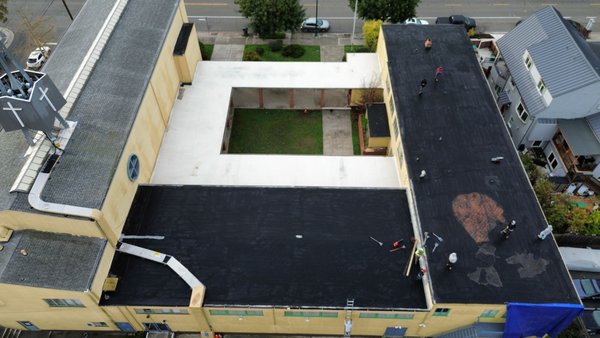 Alameda  - Project Description – Commercial Roof Replacement for Church in Alameda, CA
We completed a full commercial roof replacement for a church in Alameda, utilizing high-performance materials from Touchdown to ensure long-term durability, energy efficiency, and weather resistance.
Scope of Work Included:
Full removal and disposal of the existing roofing system
Detailed inspection and necessary repairs to the underlying structure
Installation of Touchdown commercial-grade roofing materials, known for their superior adhesion and waterproofing qualities
Reinforcement of critical areas with additional waterproofing membranes and sealants
Integration of proper drainage systems, flashing, and edge metal to meet commercial code requirements
Job site cleanup and final inspection to ensure safety and client satisfaction
The project was executed with minimal disruption to church operations and completed on time. This new roofing system not only enhances the building’s protection but also provides peace of mind for years to come. Alameda  - Project Description – Commercial Roof Replacement for Church in Alameda, CA
We completed a full commercial roof replacement for a church in Alameda, utilizing high-performance materials from Touchdown to ensure long-term durability, energy efficiency, and weather resistance.
Scope of Work Included:
Full removal and disposal of the existing roofing system
Detailed inspection and necessary repairs to the underlying structure
Installation of Touchdown commercial-grade roofing materials, known for their superior adhesion and waterproofing qualities
Reinforcement of critical areas with additional waterproofing membranes and sealants
Integration of proper drainage systems, flashing, and edge metal to meet commercial code requirements
Job site cleanup and final inspection to ensure safety and client satisfaction
The project was executed with minimal disruption to church operations and completed on time. This new roofing system not only enhances the building’s protection but also provides peace of mind for years to come.