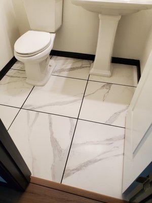 Bathroom grout color change. - Changing the bathroom grout color from white to black licorice. Turn out fantastic and another return customer.