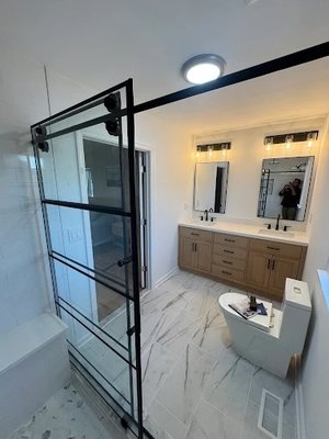 Bathroom Remodels - see examples of our recent bathroom remodel projects. Each photo demonstrates our commitment to quality, from modern spa-style retreats with sleek tilework and frameless showers to classic and elegant bathrooms with detailed cabinetry and luxurious soaker tubs. You’ll also find examples of small bathrooms transformed with bold accent walls and clever storage, as well as contemporary designs featuring floating vanities and minimalist fixtures. Our portfolio includes accessible bathrooms that combine comfort, safety, and style.
Call us today for your free estimate and let us help bring your dream bathroom to life! Bathroom Remodels - see examples of our recent bathroom remodel projects. Each photo demonstrates our commitment to quality, from modern spa-style retreats with sleek tilework and frameless showers to classic and elegant bathrooms with detailed cabinetry and luxurious soaker tubs. You’ll also find examples of small bathrooms transformed with bold accent walls and clever storage, as well as contemporary designs featuring floating vanities and minimalist fixtures. Our portfolio includes accessible bathrooms that combine comfort, safety, and style.
Call us today for your free estimate and let us help bring your dream bathroom to life!