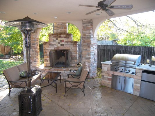 Outdoor Kitchen and Upper Balcony - Added 2nd floor balcony and lower outdoor kitchen and wood fireplace